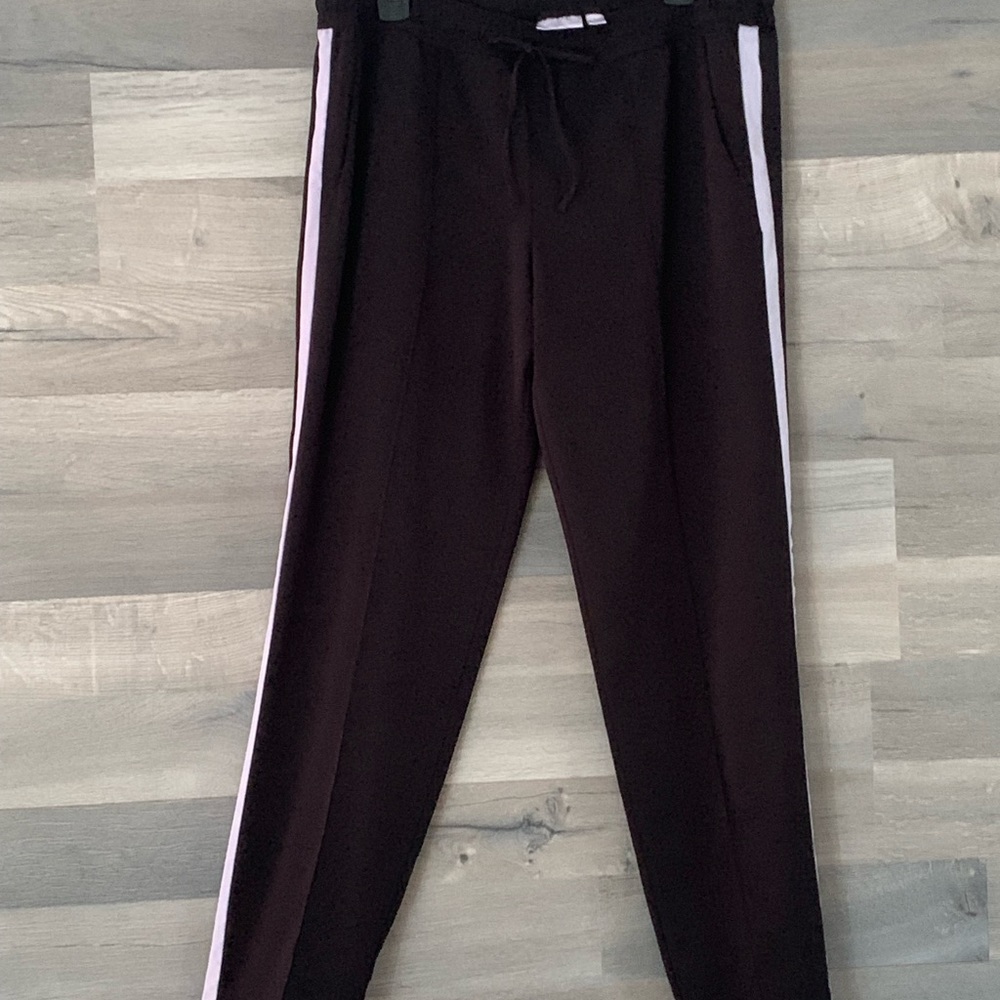 2 pair of pants.  1-Tuxedo pants size L and 2- Soho white pants size M